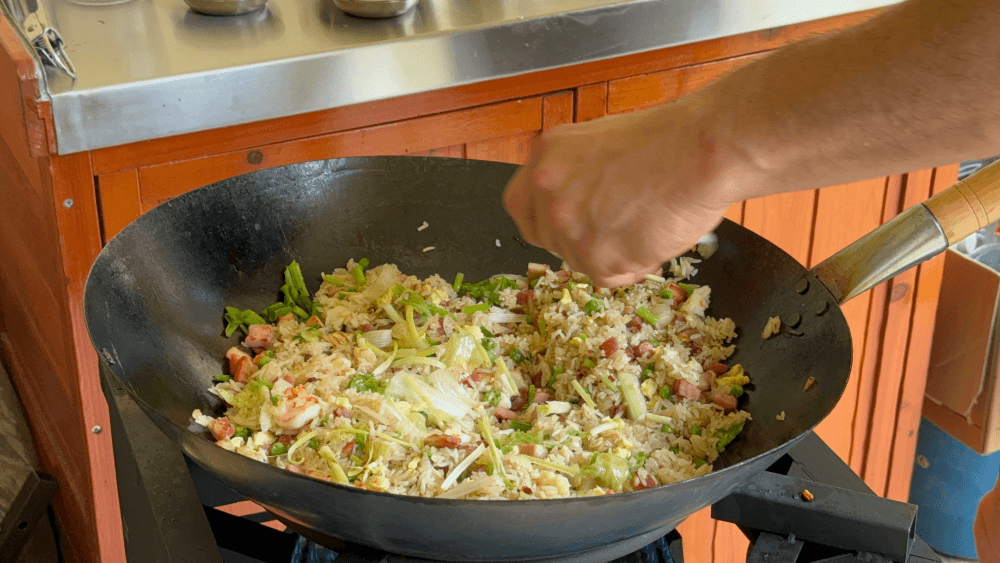 Fried rice being tossed in Jose’s wok